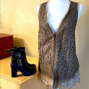 Leather like vest with lace. NWT